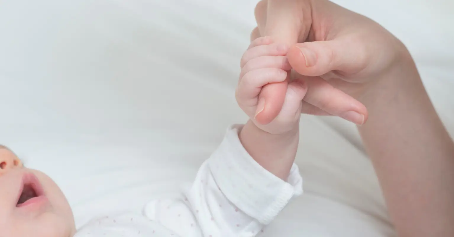 Grieving mom mourns death of 6-month-old daughter born both a quadruplet and an identical twin