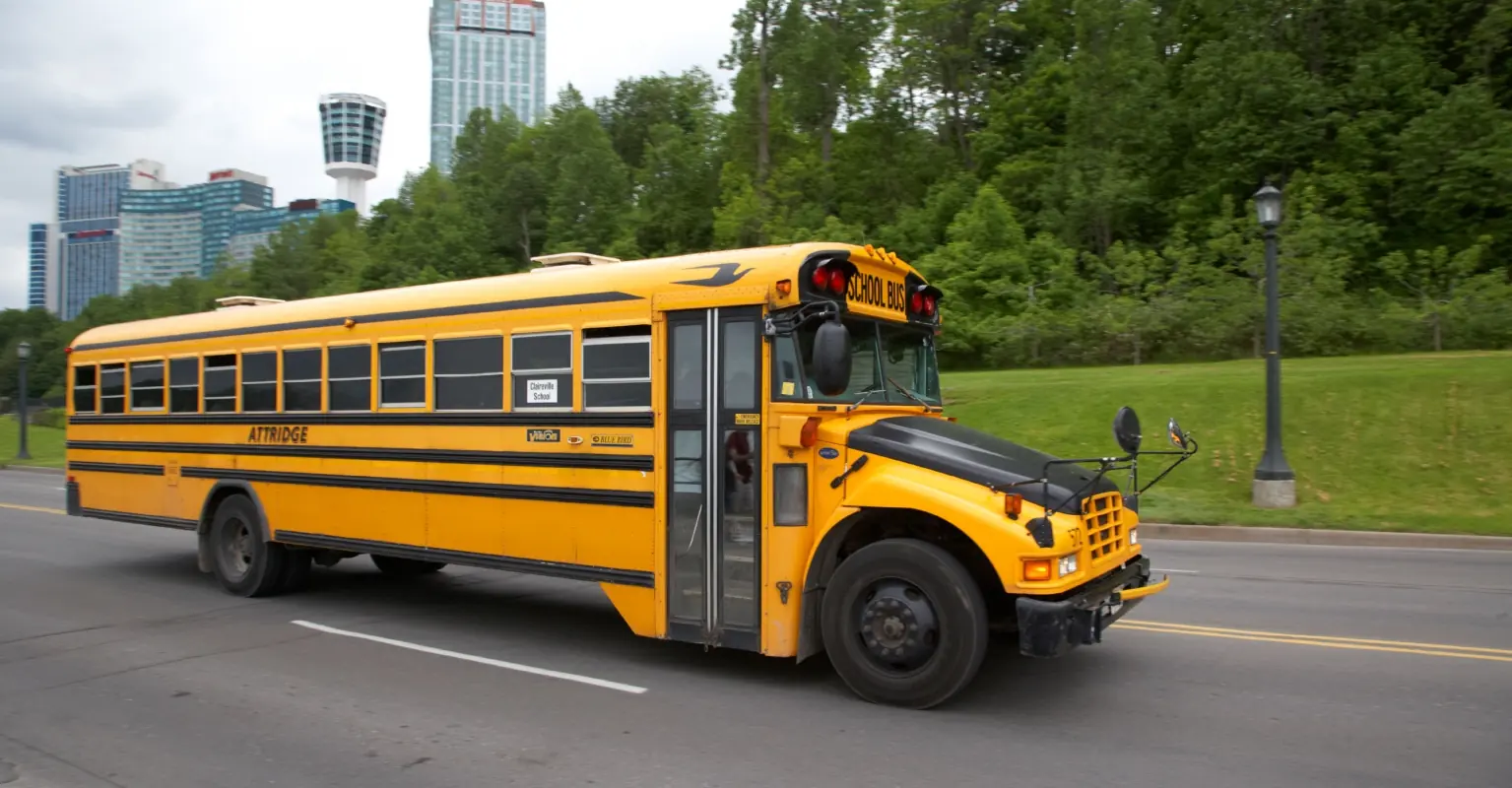 Screaming children climb out of school bus windows after driver speeds away after altercation with parent