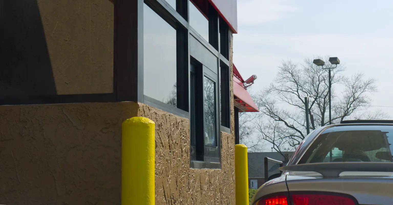 Surveillance footage captures someone trying to abduct barista through drive-thru window