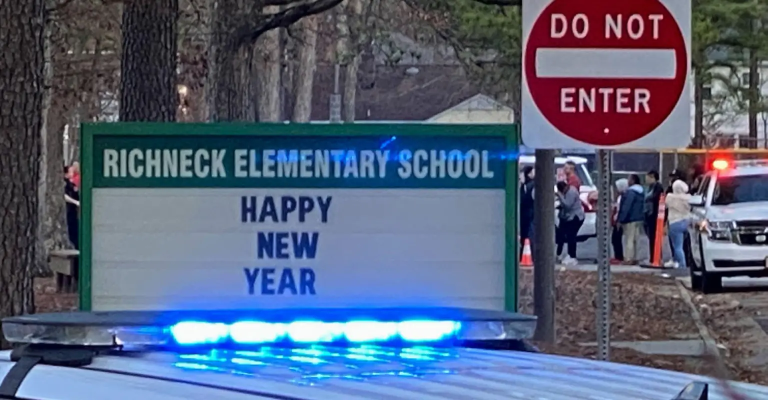 Teacher shot by 6-year-old was trying to confiscate gun, parent says