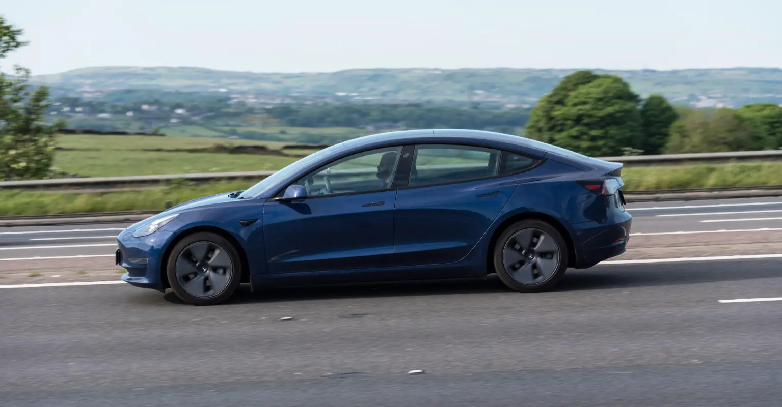 Tesla 'spontaneously' catches fire on highway and becomes 'engulfed in flames'