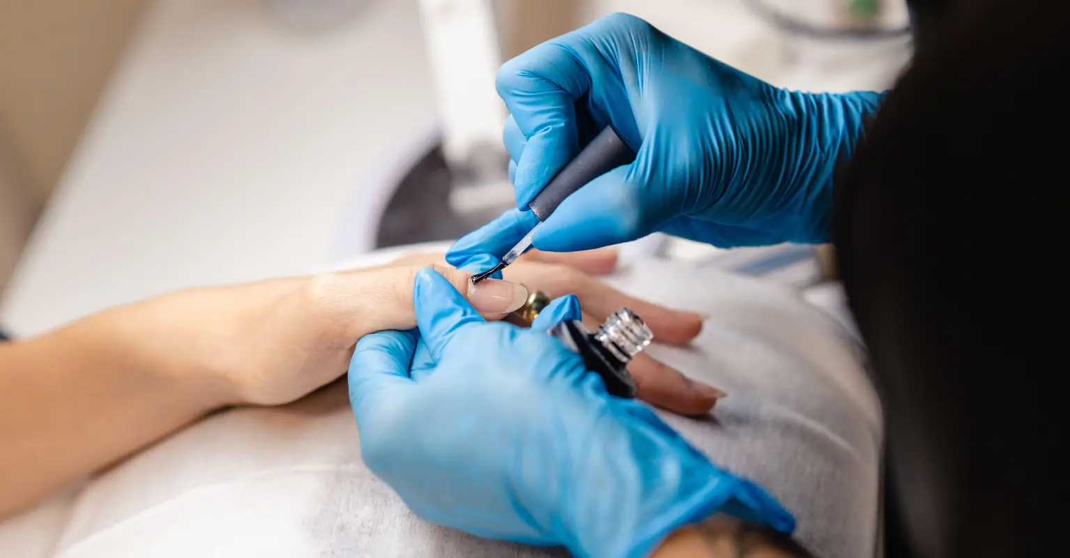 Mom hits back after being trolled for letting young daughters have long acrylic nails