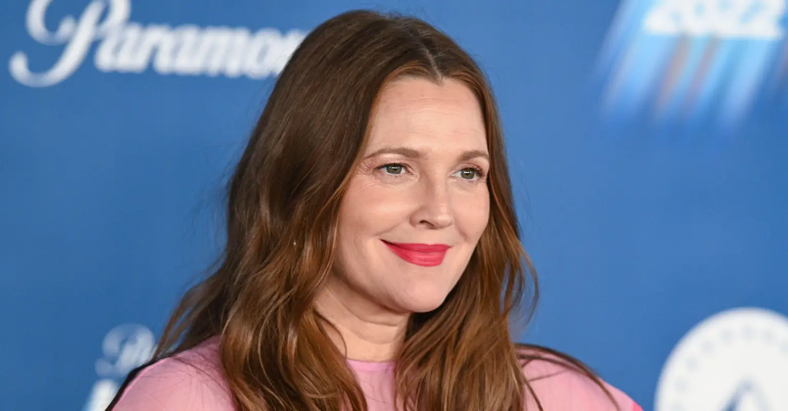 Fans swiftly defend Drew Barrymore for kneeling in front of trans influencer Dylan Mulvaney