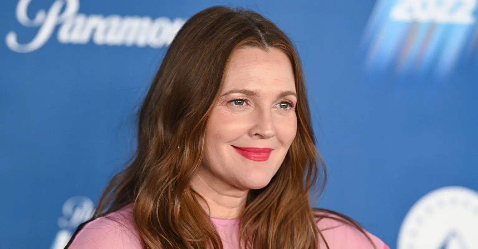 Fans swiftly defend Drew Barrymore for kneeling in front of trans influencer Dylan Mulvaney