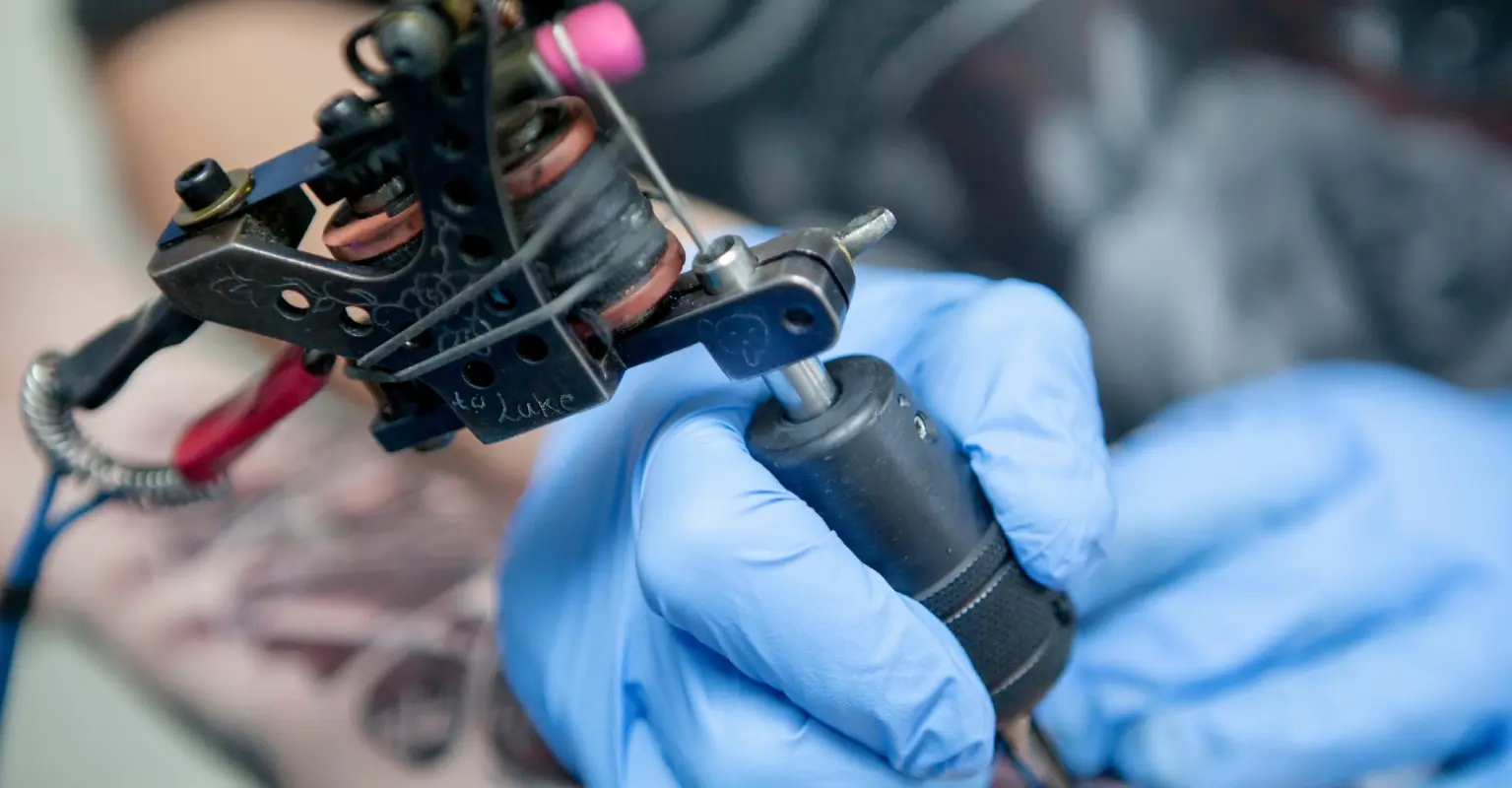 Ex-banker who became a genderless reptilian says their son has rejected them