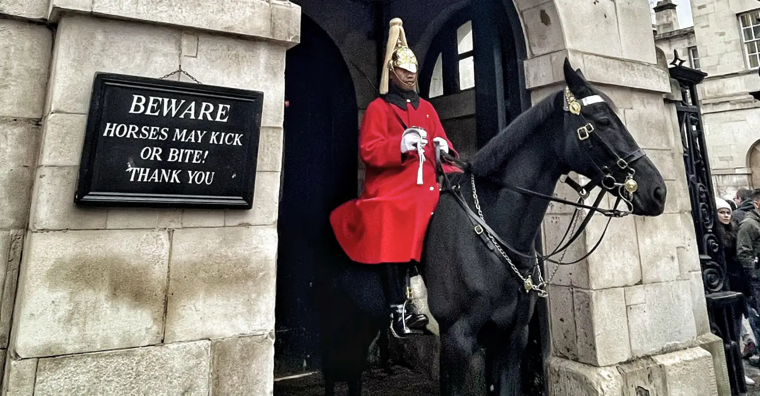 King's Guard yells at woman for touching his horse - she does it again
