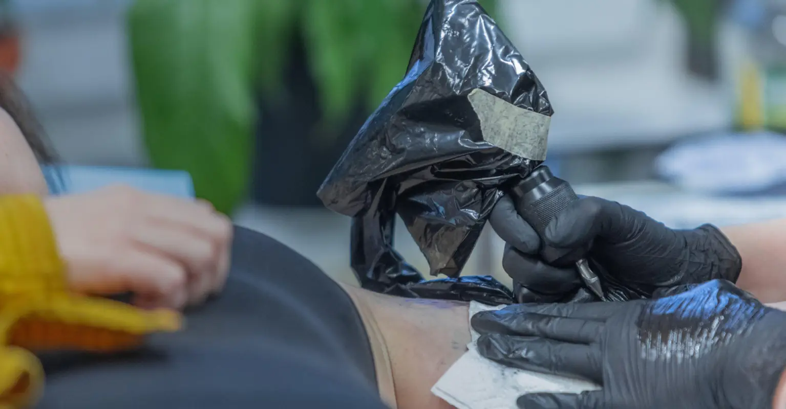 Woman gets blackout neck tattoo and immediately regrets it
