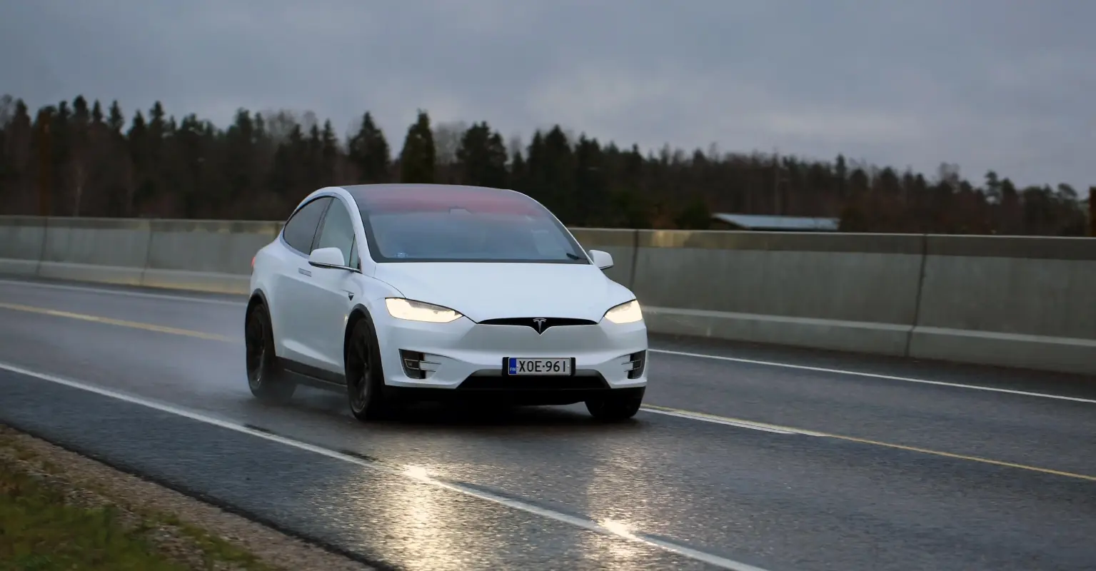 Woman appears to be sleeping at the wheel of Tesla on California highway