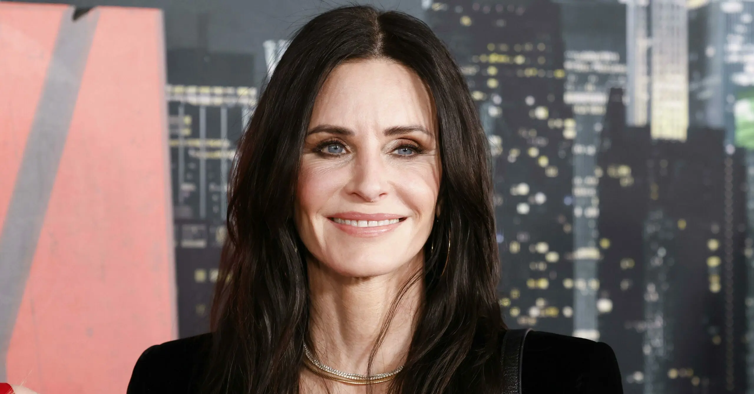 Courteney Cox lets her inner Monica Geller out as she scrubs her star on Walk of Fame clean