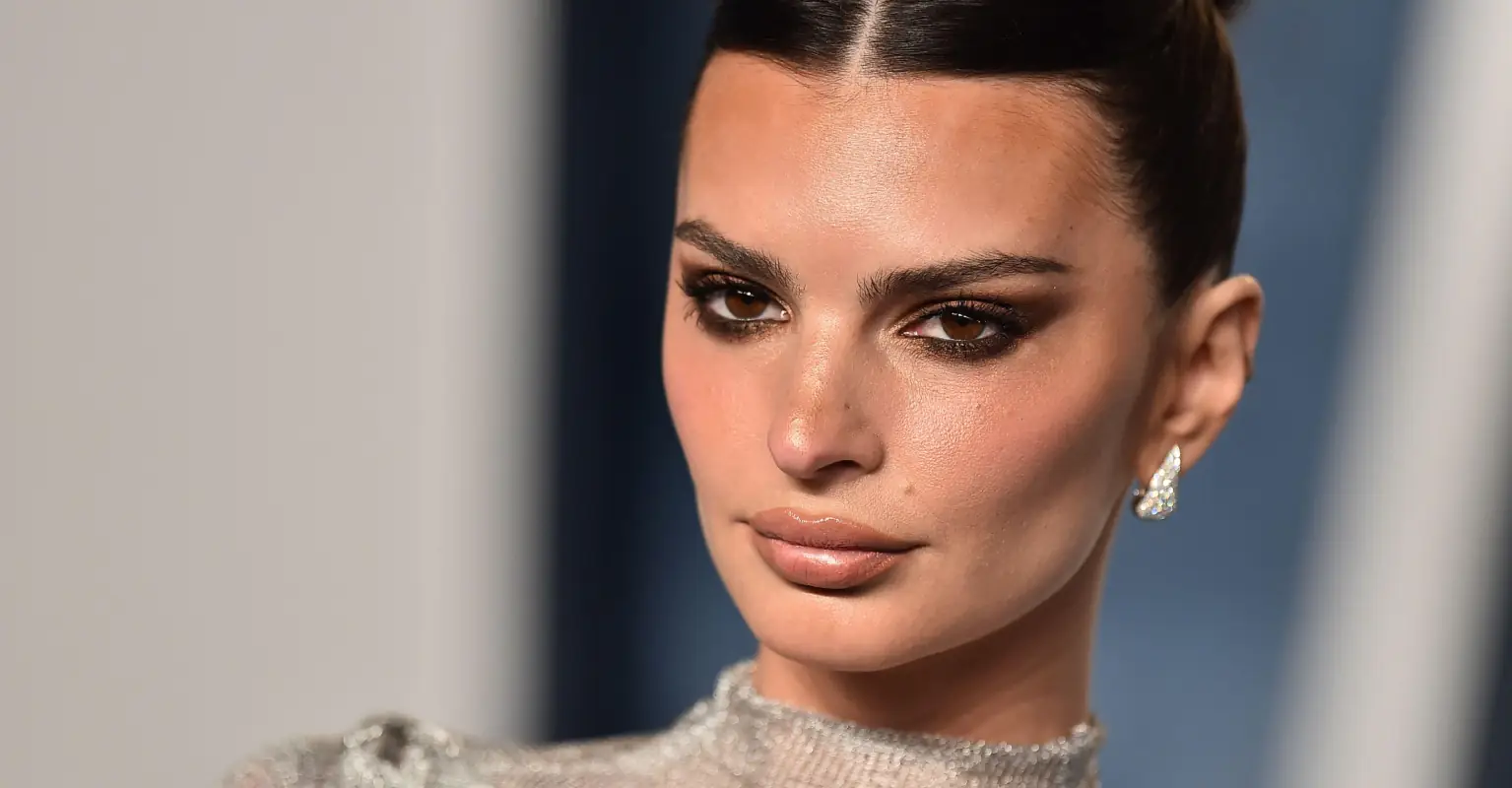 Emily Ratajkowski and Harry Styles spotted passionately making out behind a car