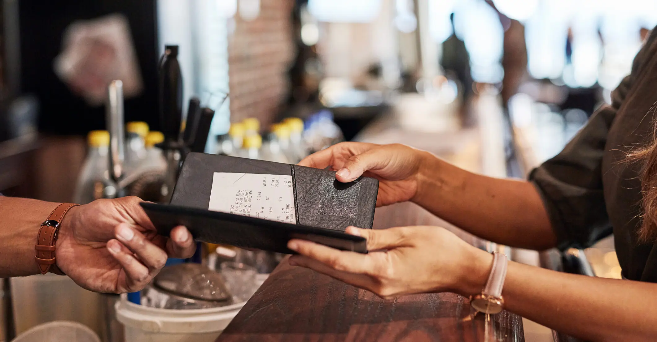 Woman baffled after finding 'employee health' charge on check at restaurant