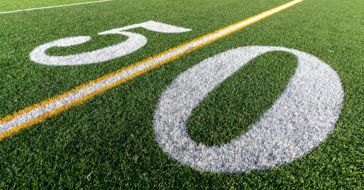 High school football coach who was fired for praying with players wins $1.7 million settlement