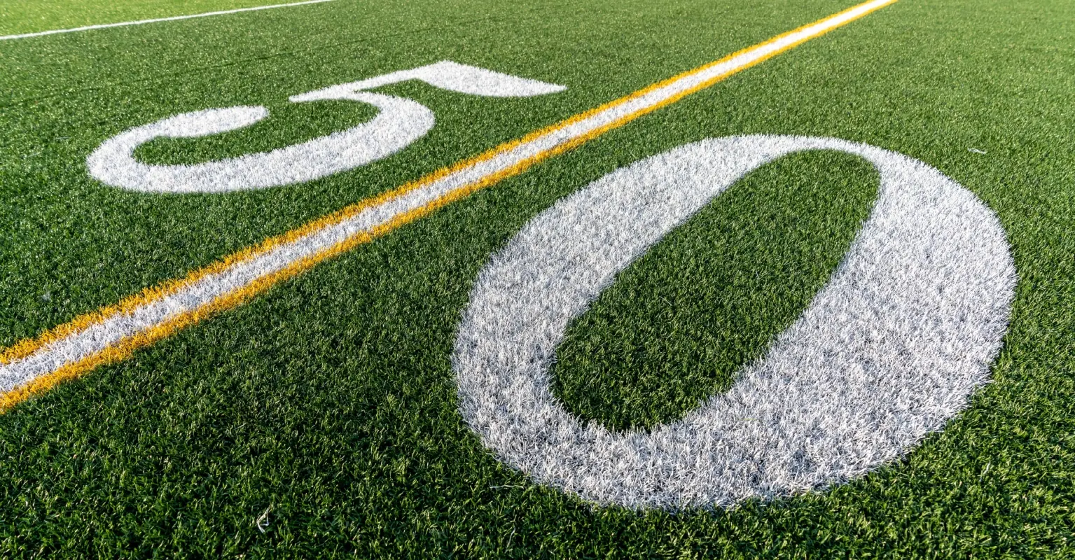 High school football coach who was fired for praying with players wins $1.7 million settlement