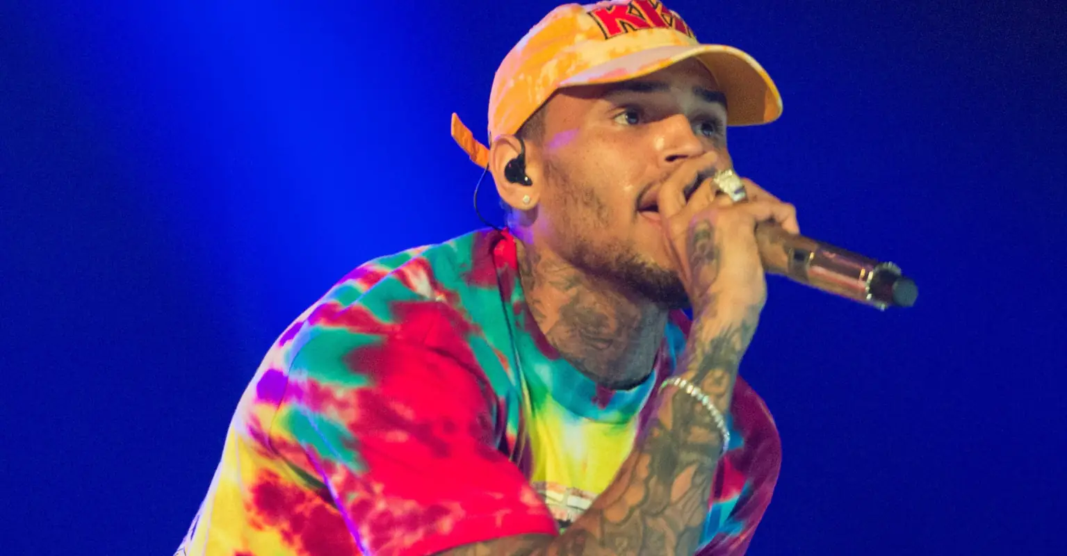 Fan whose neck Chris Brown grabbed on stage speaks out after backlash