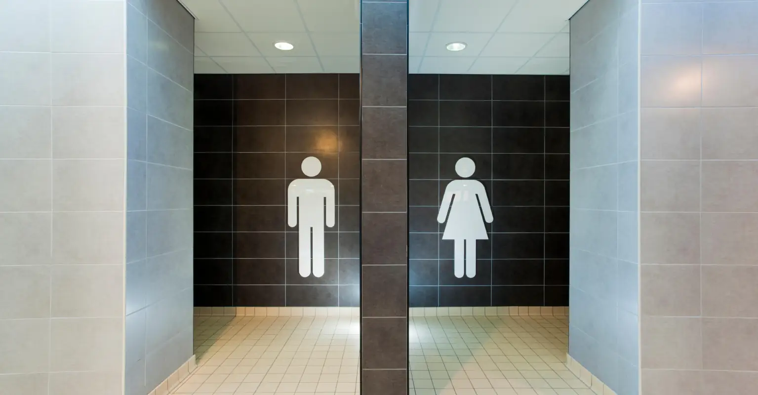 Swimmer issued a warning after breaking club's 'no-nudity rule' in changing rooms