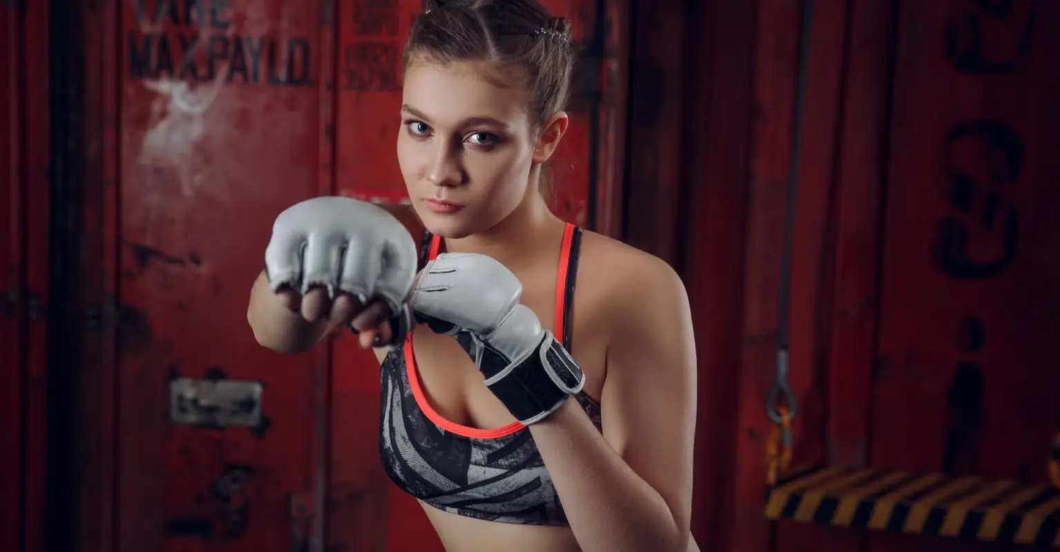 MMA fighters leave fans stunned as they kiss during pre-fight face-off