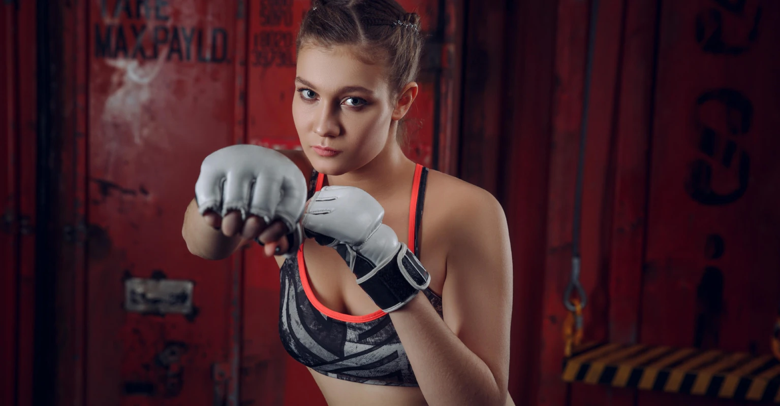 MMA fighters leave fans stunned as they kiss during pre-fight face-off