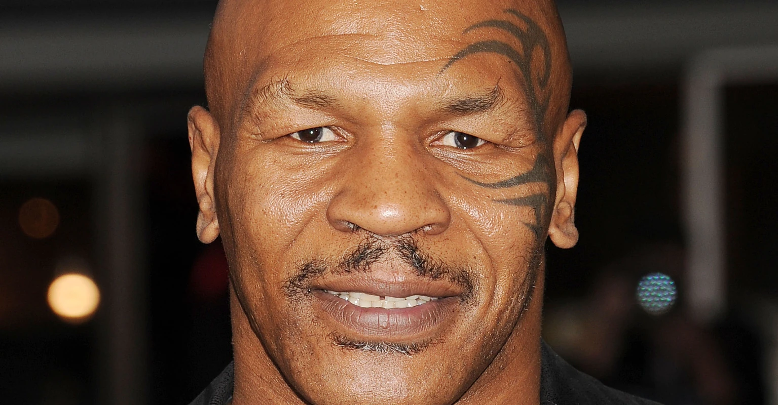 Bizarre footage shows Mike Tyson cradling Hasbulla like a baby and appearing to 'nibble' his ear