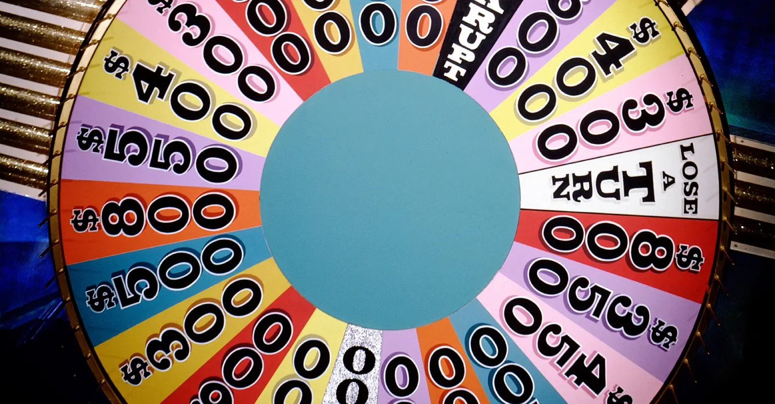 'Wheel of Fortune' host Pat Sajak 'tackles' contestant in bizarre clip