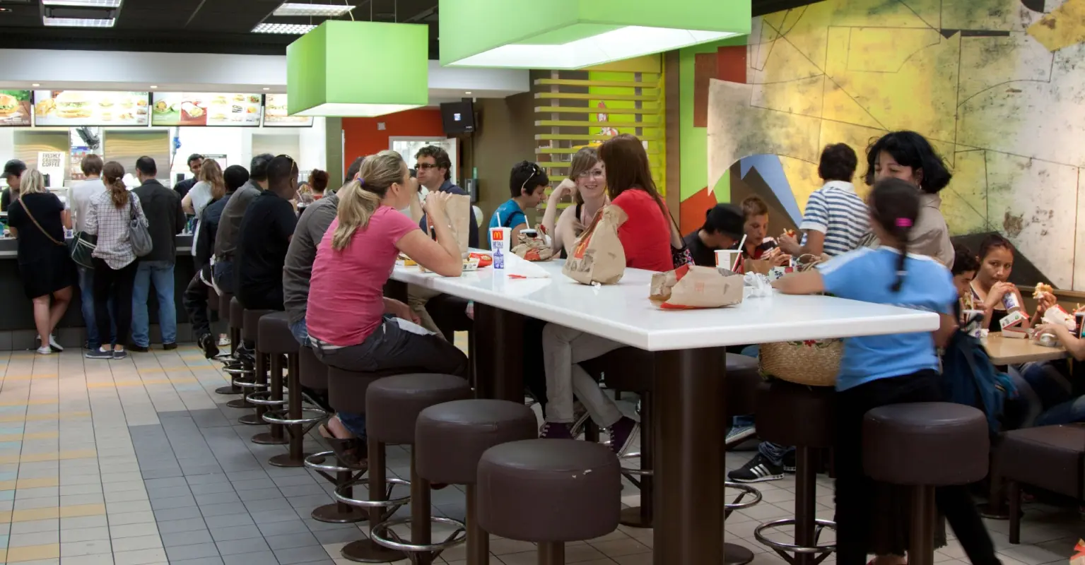 McDonald's diners spark outrage after letting dog sit on table in restaurant