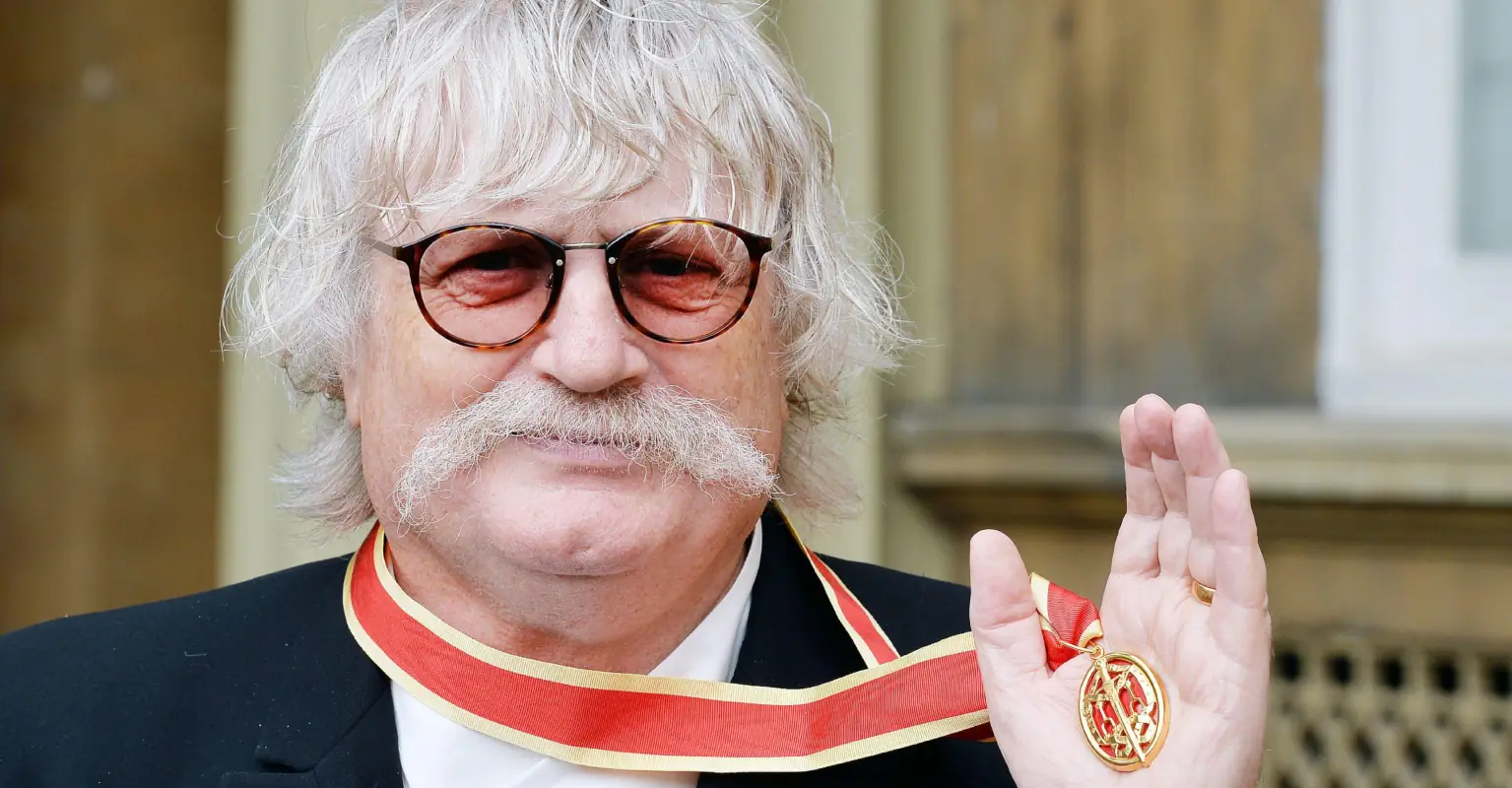 Man with mullet and glasses at King's Coronation insists he wasn't Meghan Markle in disguise