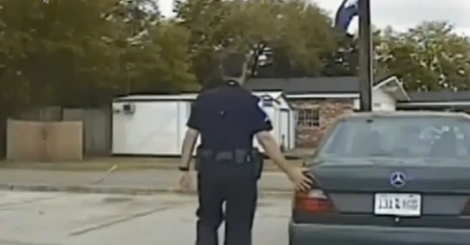 Reason police officers touch the back of vehicles during traffic stops explained