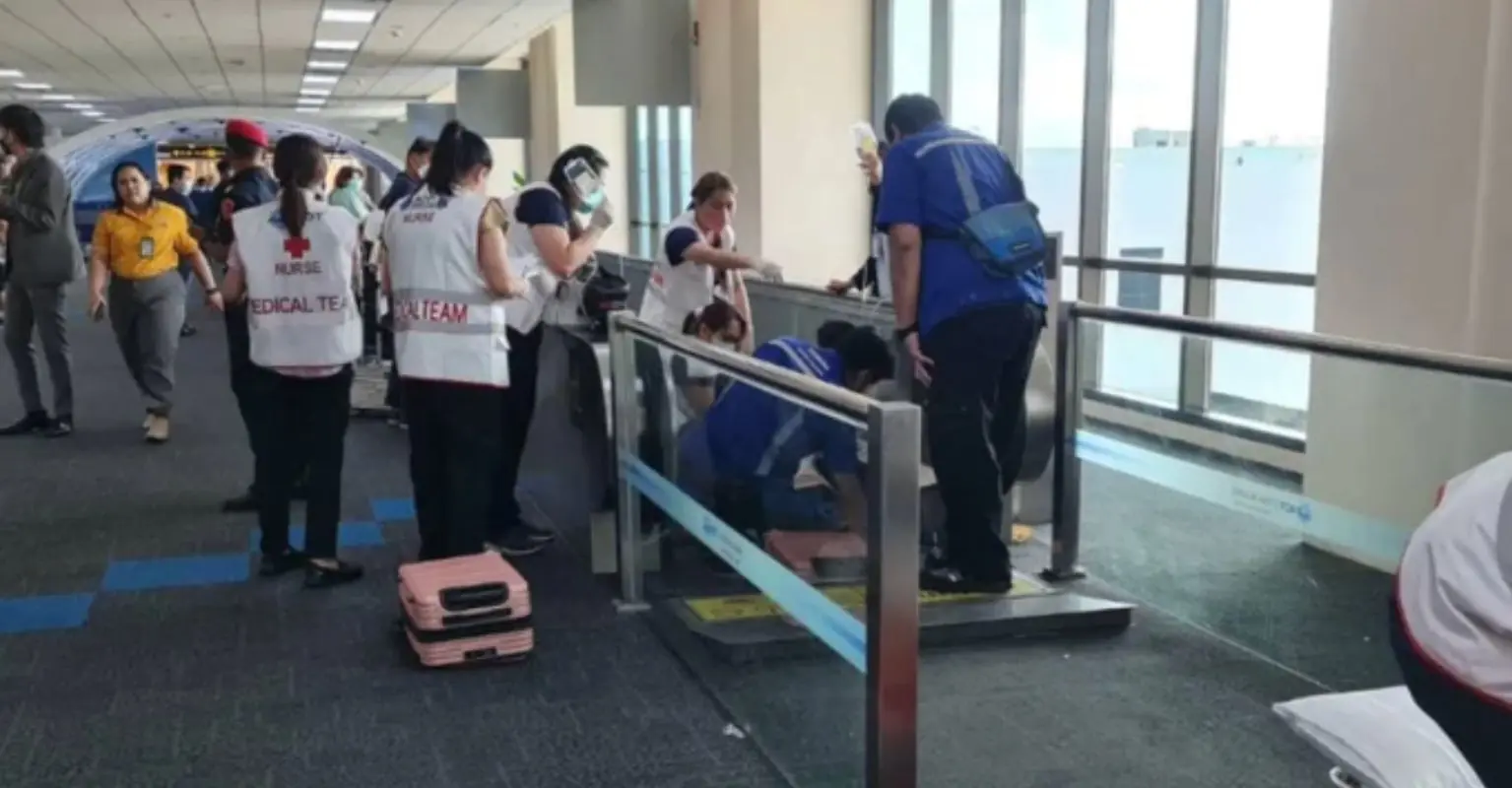 Woman's leg amputated at airport after becoming trapped in moving walkway