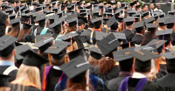 College student boldly grabs microphone from administrator to voice her anger on graduation day