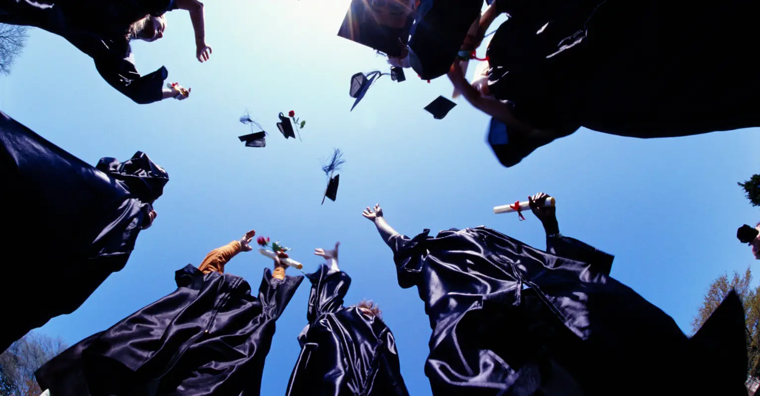 'Super dad' graduates with master's degree while working 3 jobs