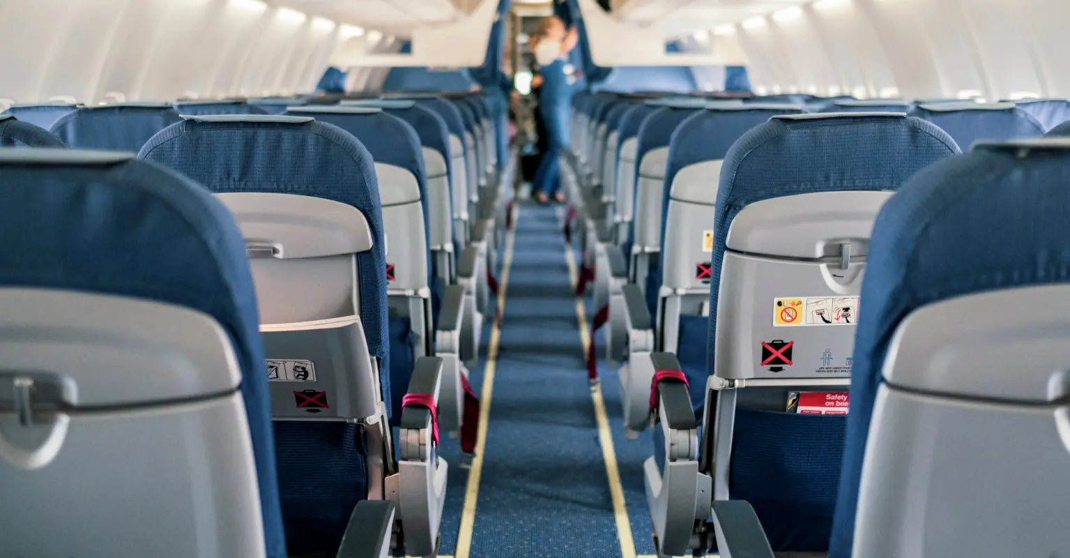 Black plane passenger records the moment she confronts man sending 'racist texts' about her