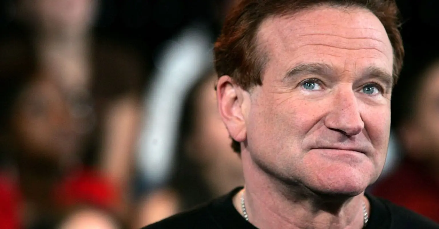 Robin Williams' son hits out at man who accused the late comedian of leaving 'his family behind'