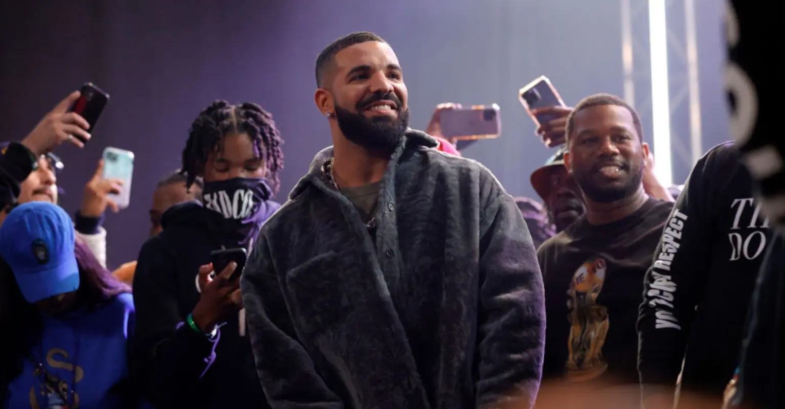 Woman who caught Drake's attention by throwing 36G bra at him gets contacted by Playboy