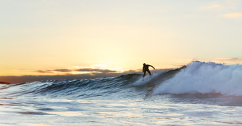 Pro surfer Mikala Jones dies after freak water accident that severed his artery
