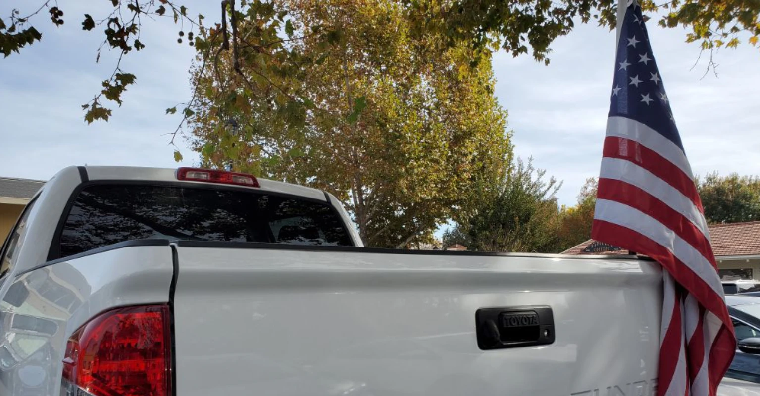 Family pull teen out of school after he's told to remove American flags from his truck