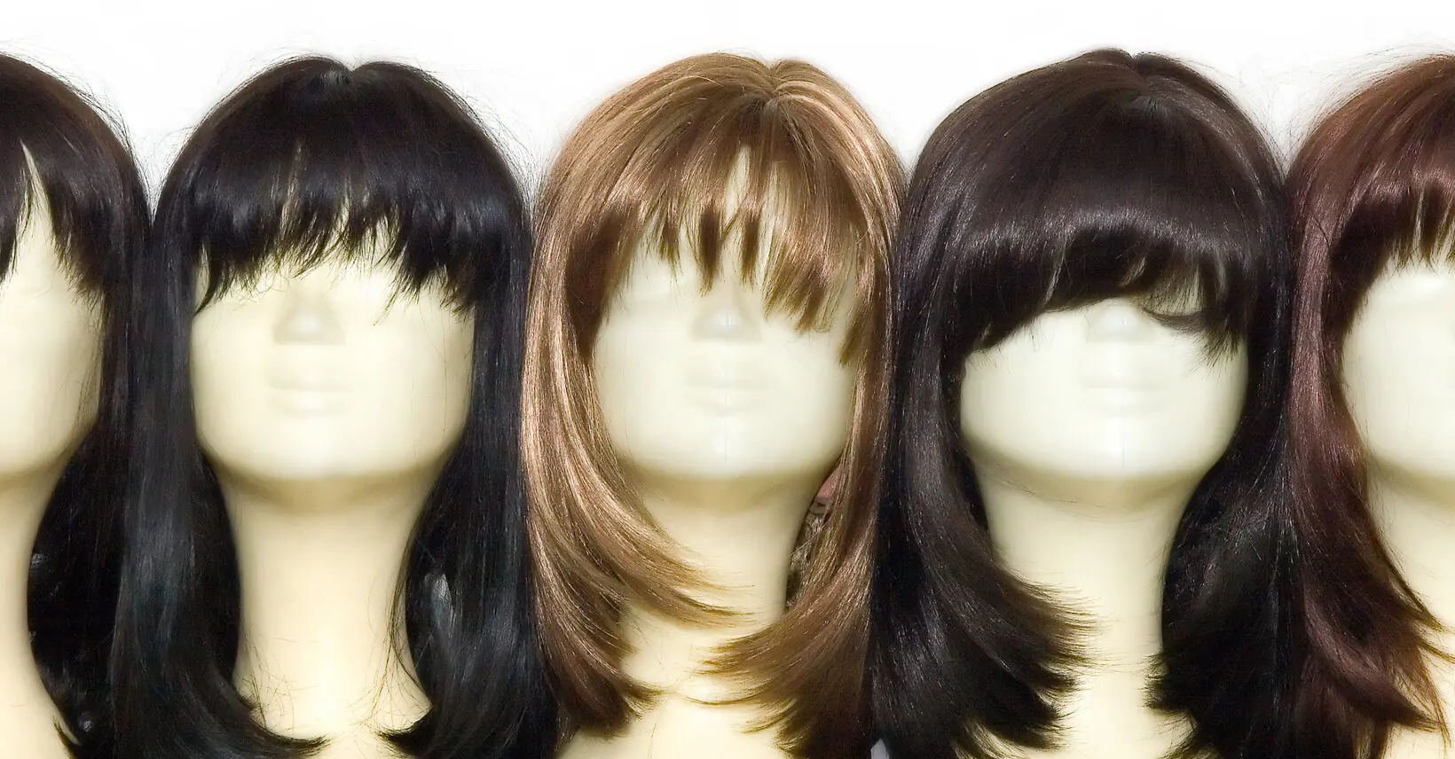 Woman says she started wearing 'terrible wigs' to work after they banned her pink hair