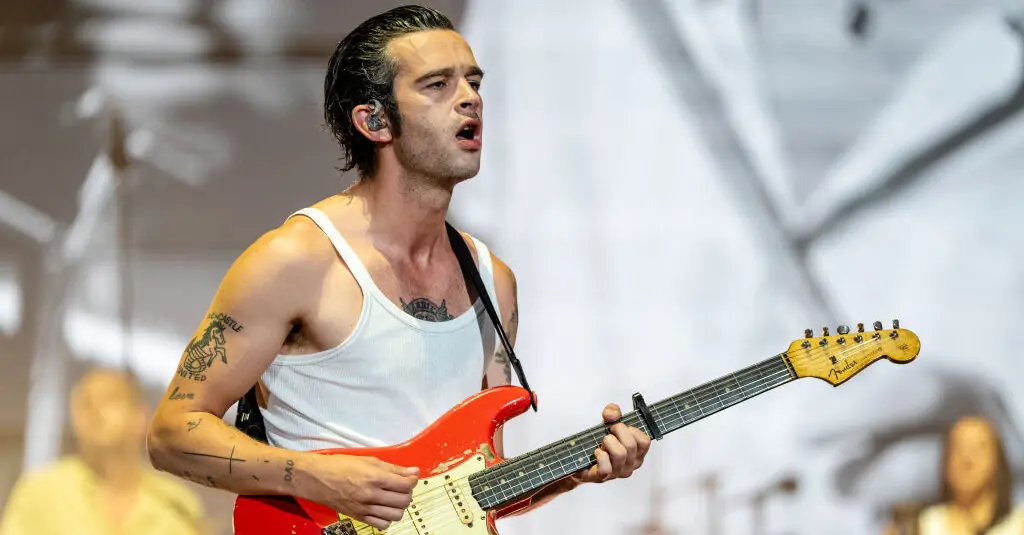 Matty Healy and The 1975 sued for $2.7 million after festival was canceled when they shared same-sex kiss on stage