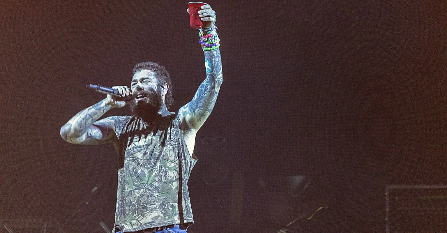 Post Malone gifts his 5k guitar to young fan at concert