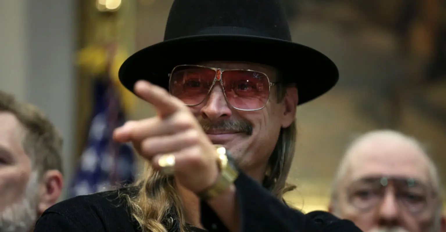 Kid Rock seen drinking bud light at concert after shooting cans of the beer in protest
