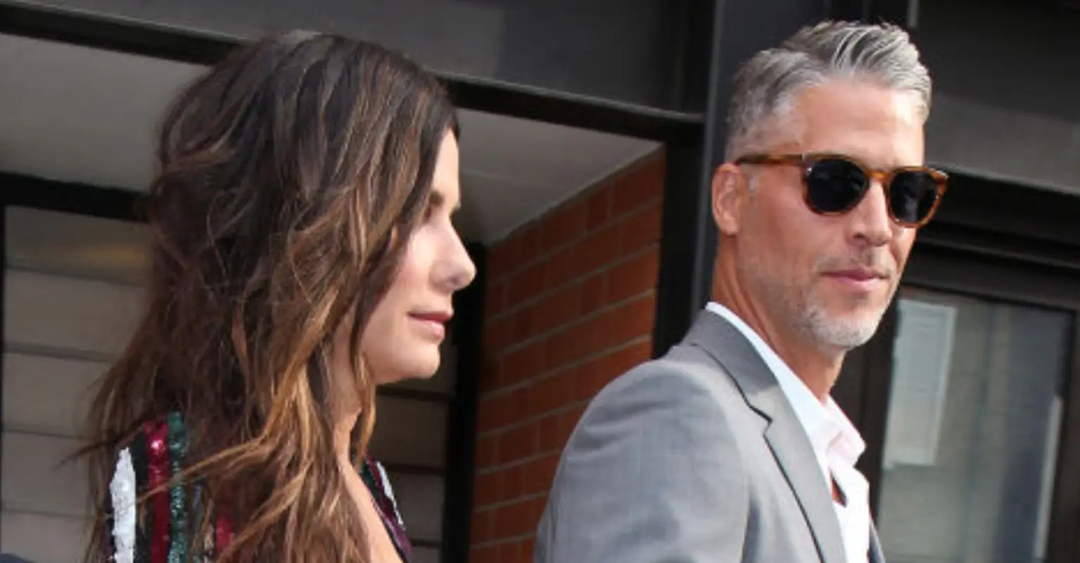 Tributes pour in for Sandra Bullock's partner Bryan Randall after he dies at 57