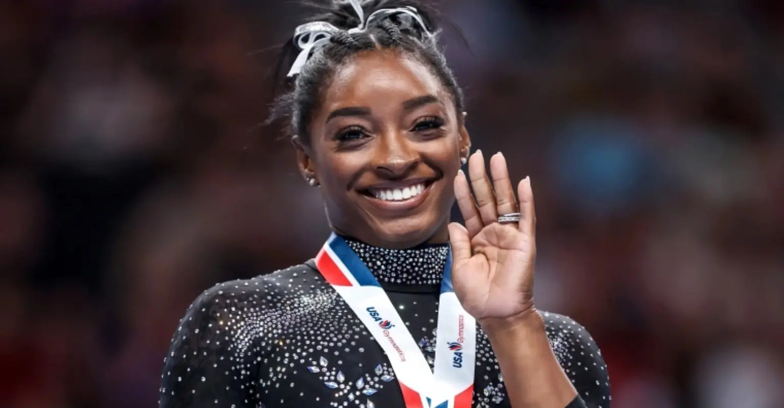 Simone Biles makes history as she wins gymnastics championship for 8th time