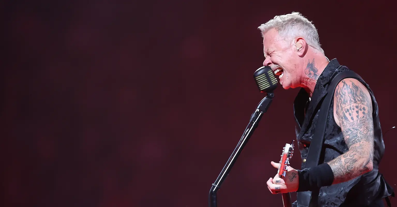 Dog sneaks out of owner's home and is spotted sitting in Metallica concert