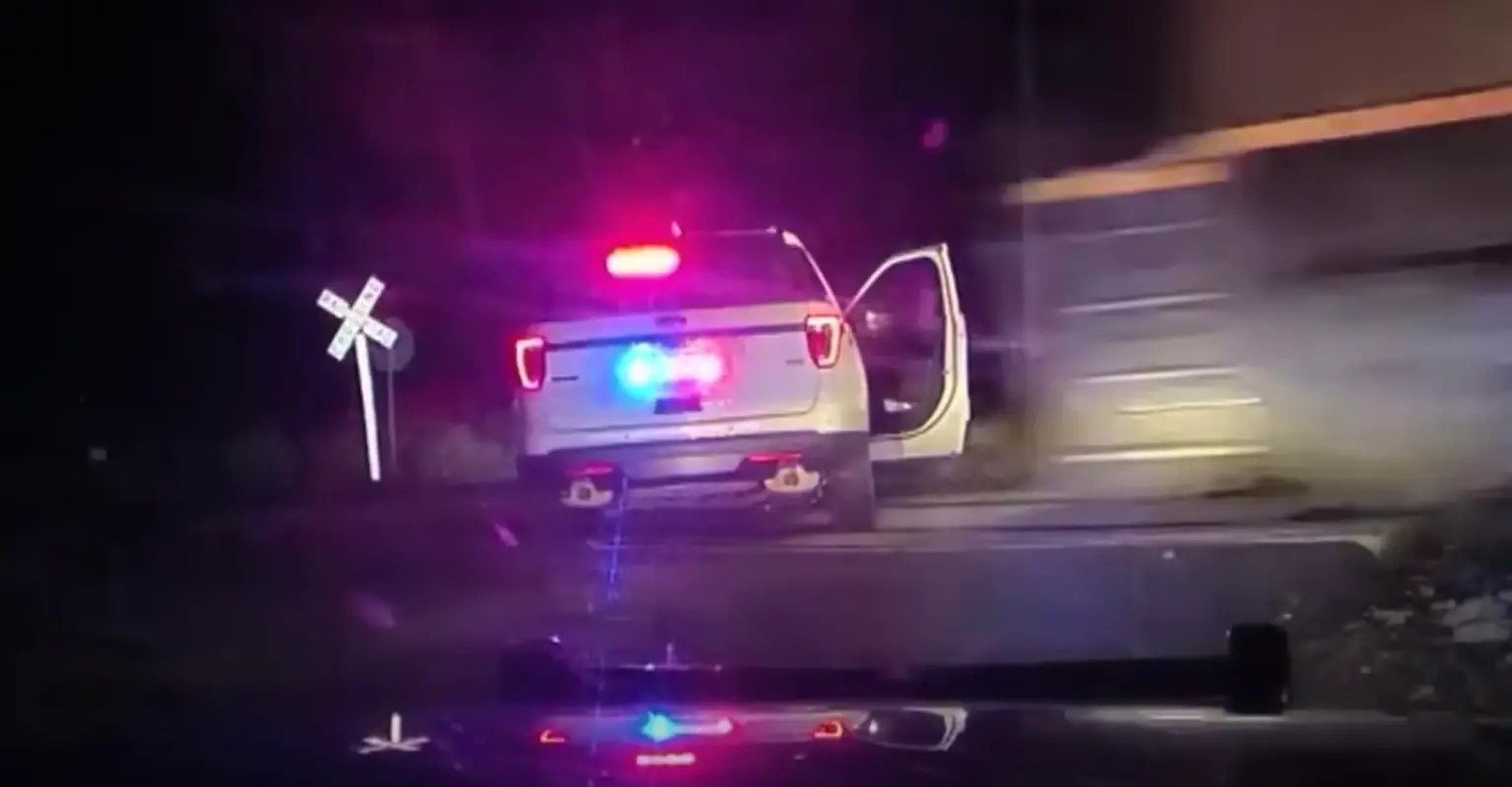 Cop who placed handcuffed woman into police car that was then hit by a train avoids jail time