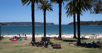 Photo of identically-dressed people in apparent trance-like state at the beach terrifies locals