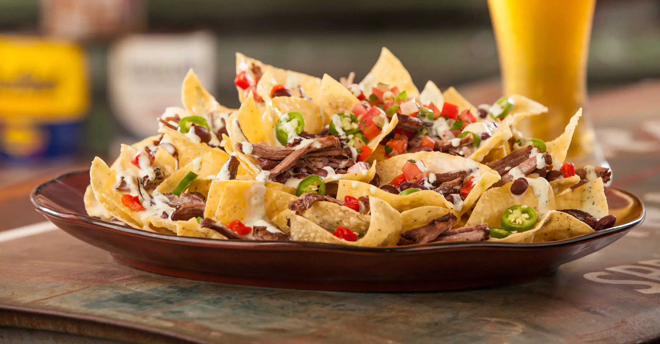 Mom-of-12 divides opinion after serving children nachos from baby pool