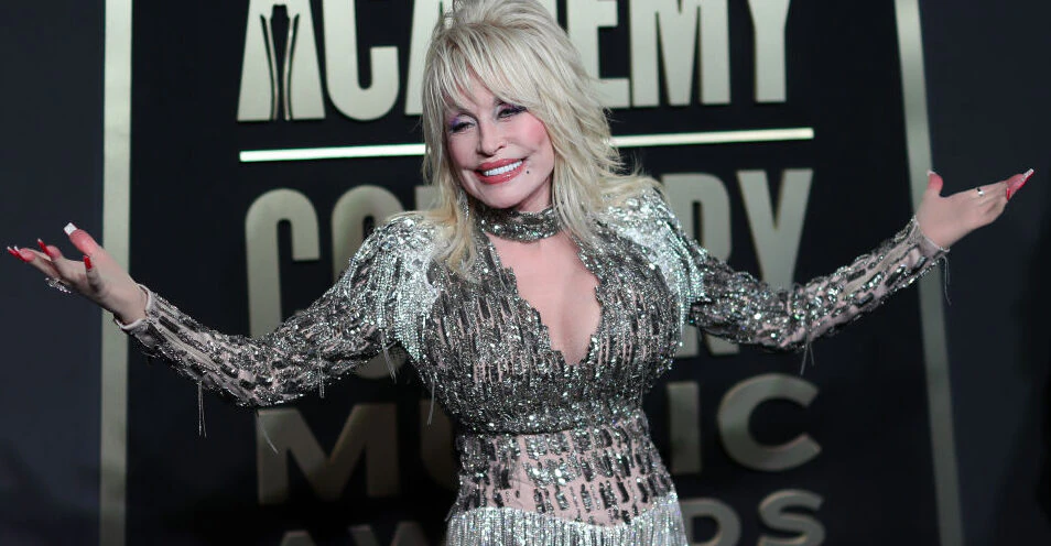 Dolly Parton responds to rumors her boobs caused her to 'break her back'