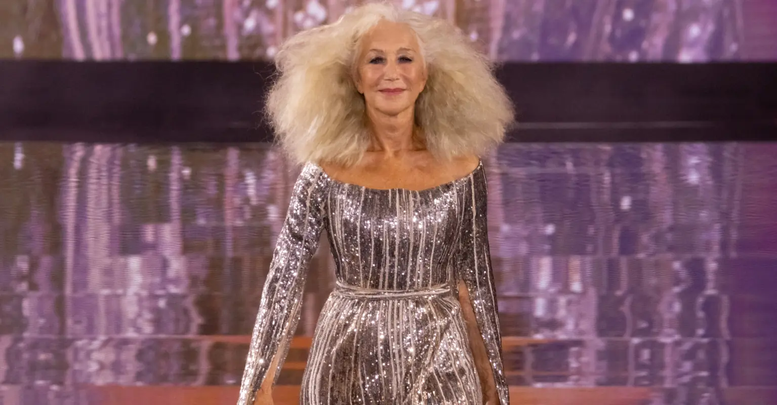 Dame Helen Mirren looks breathtaking as she walks the runway at 78