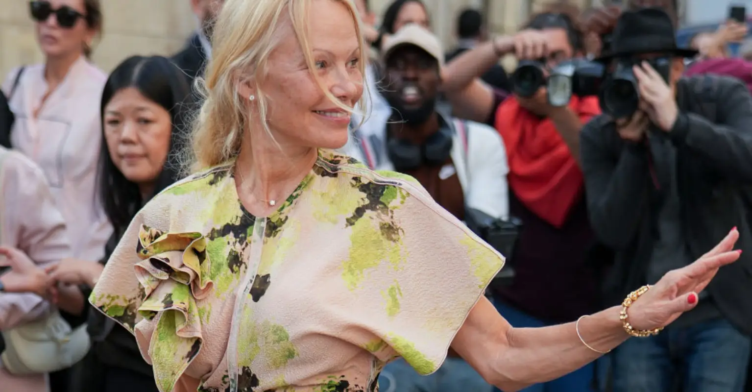Pamela Anderson attends Paris Fashion Week au naturel after sharing heartbreaking reason for ditching makeup