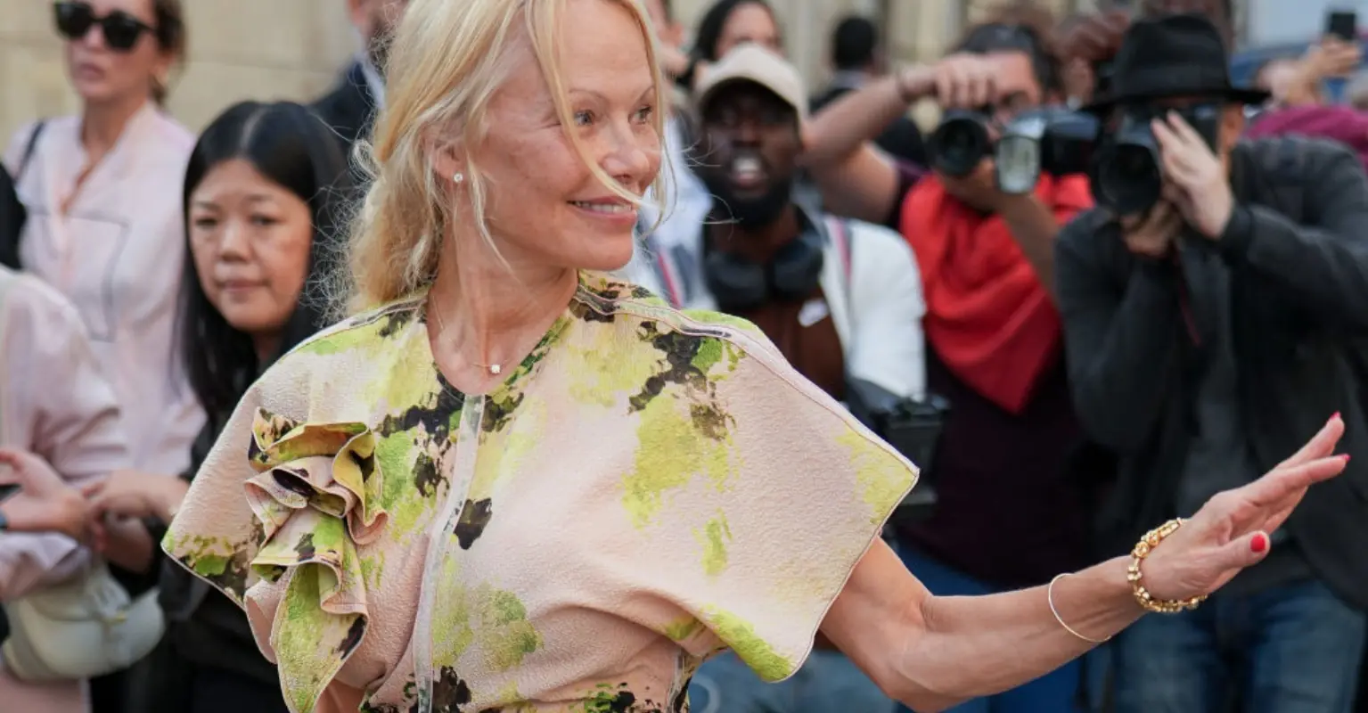 Pamela Anderson attends Paris Fashion Week au naturel after sharing heartbreaking reason for ditching makeup