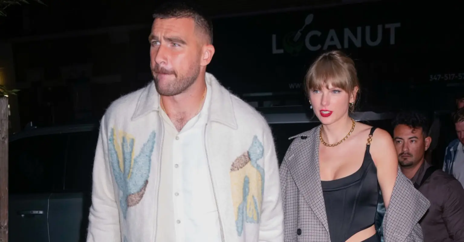 Travis Kelce and Taylor Swift hold hands before making surprise SNL appearance