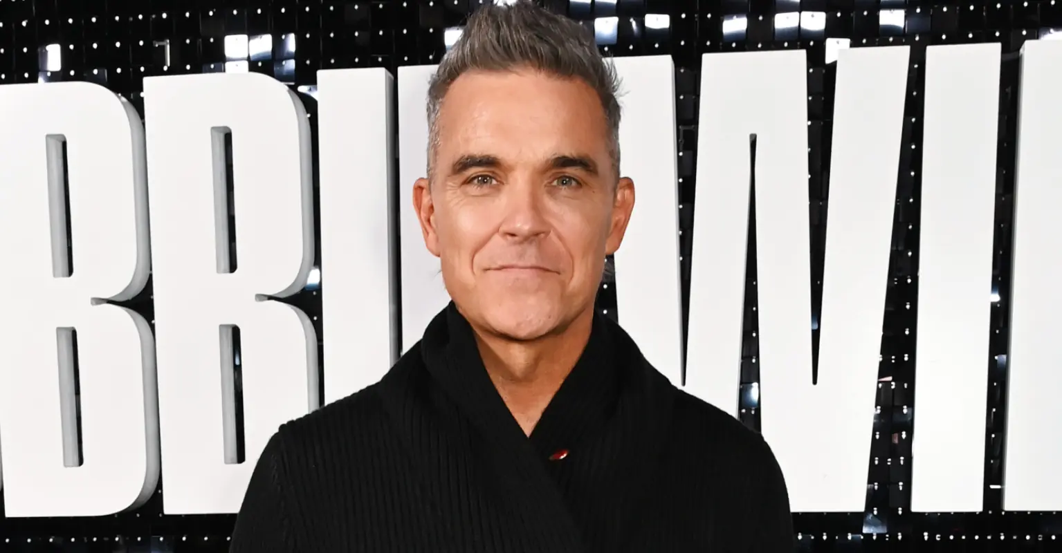 Woman fighting for her life after horrific fall while attending Robbie Williams concert